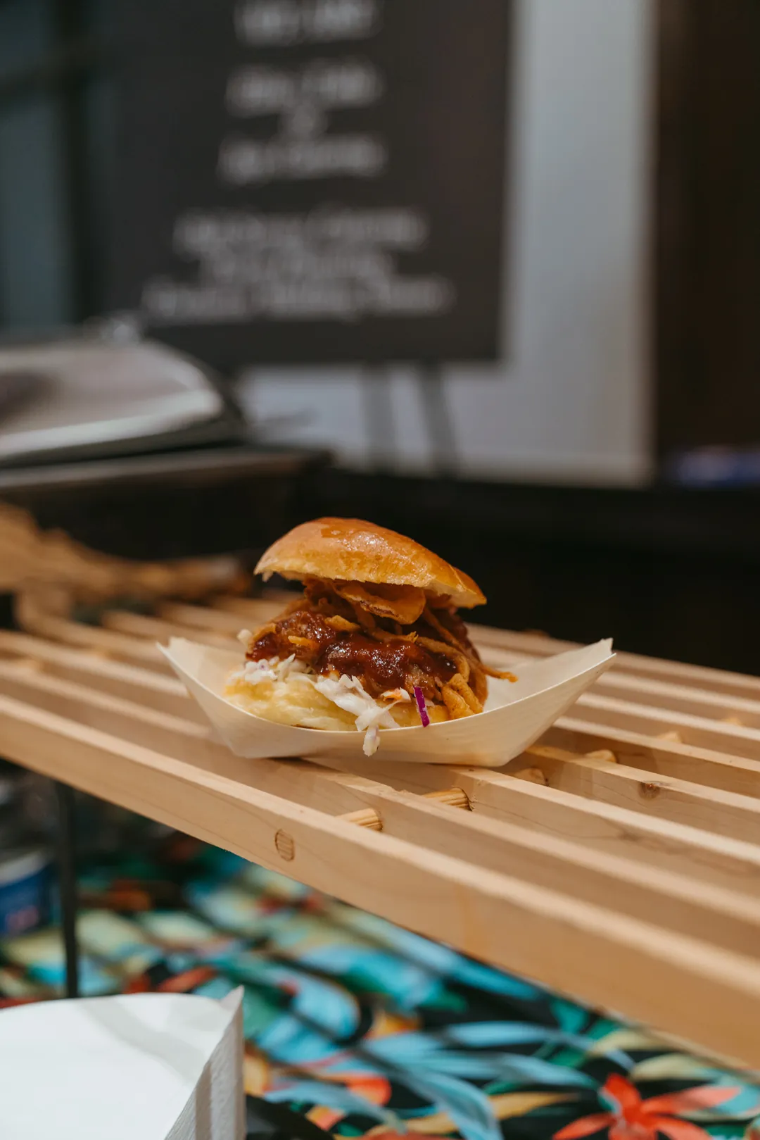 Kalua pulled pork slider with apple slaw and crunchy onions