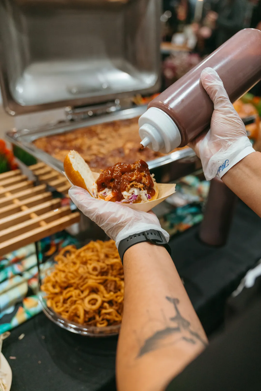 Barbecue sauce added to a Kalua pulled pork slider