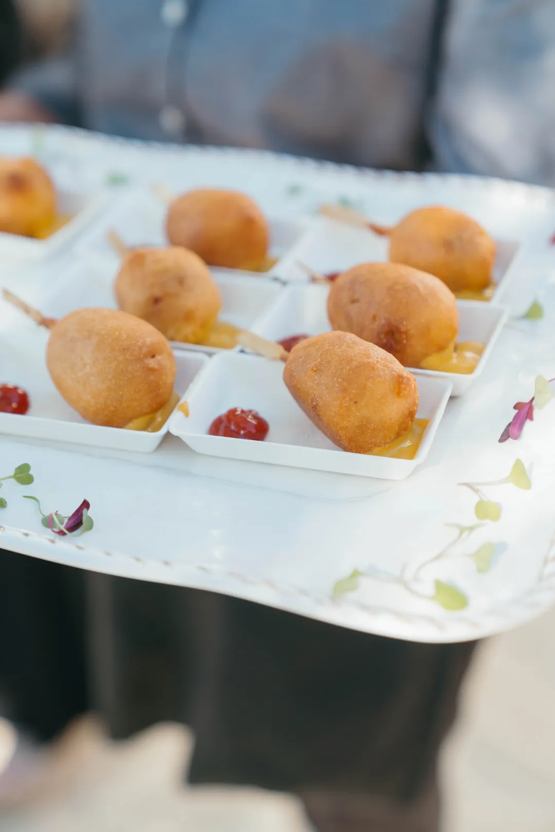Tray of mini corn dogs with ketchup