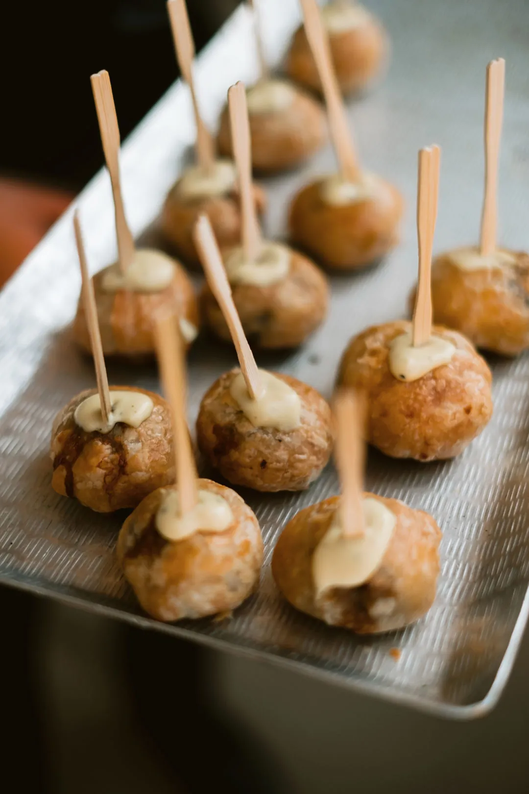 Tray of mini beef Wellingtons served on picks