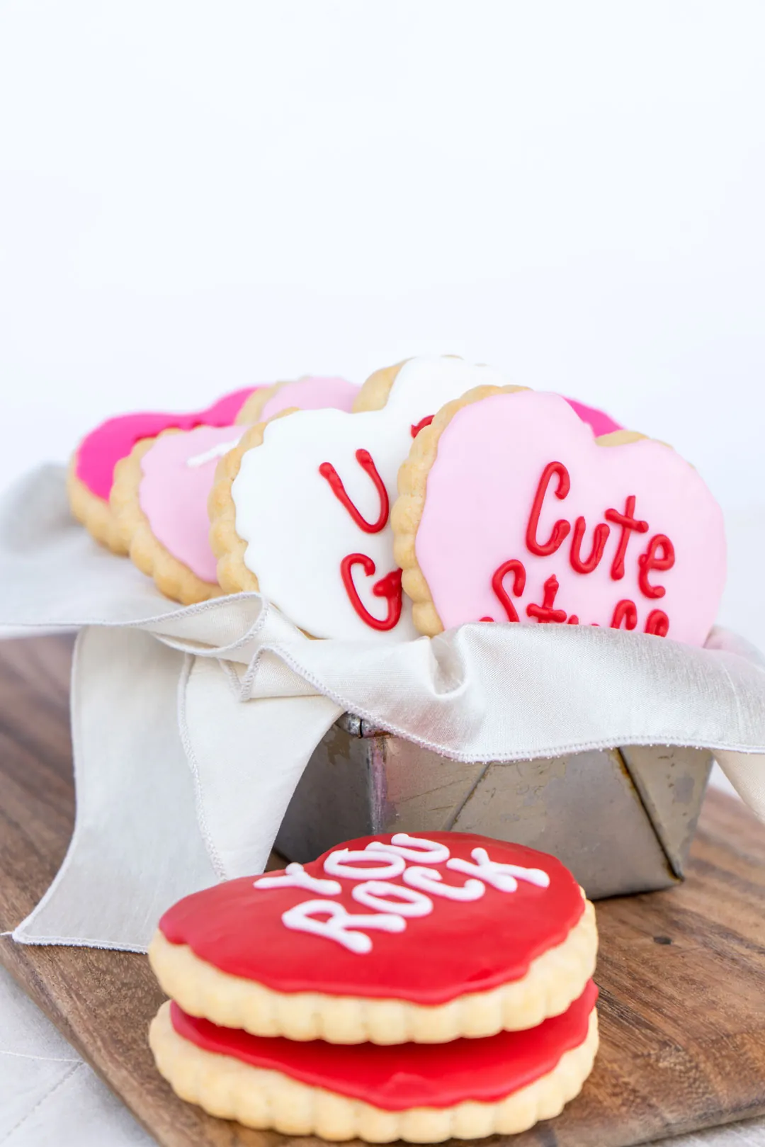 Large You Rock conversation heart cookie with smaller cookies in the background