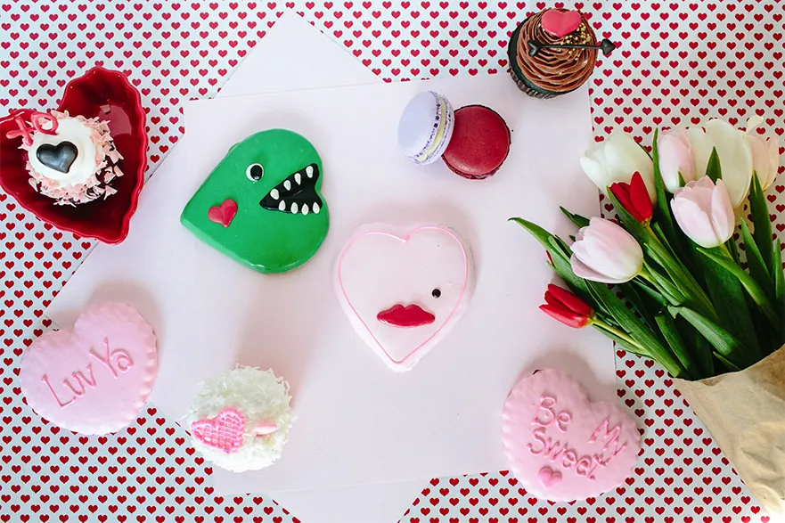 Valentine cupcakes, sugar cookies, macarons, and tulips