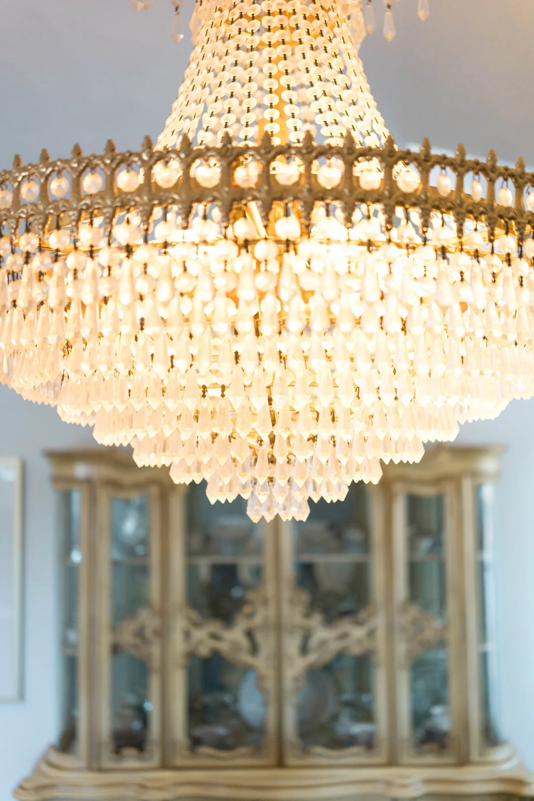 Close view of a tiered crystal chandelier