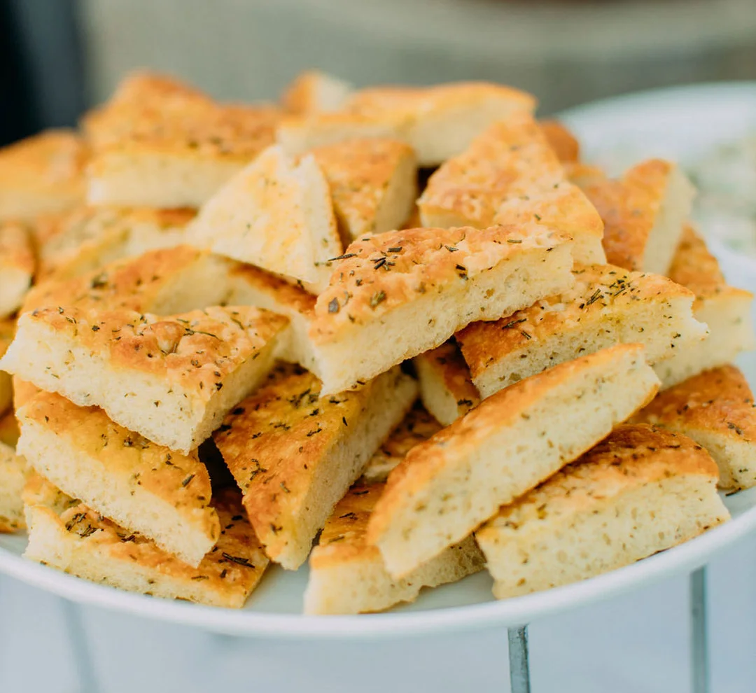Tray of herb focaccia pieces