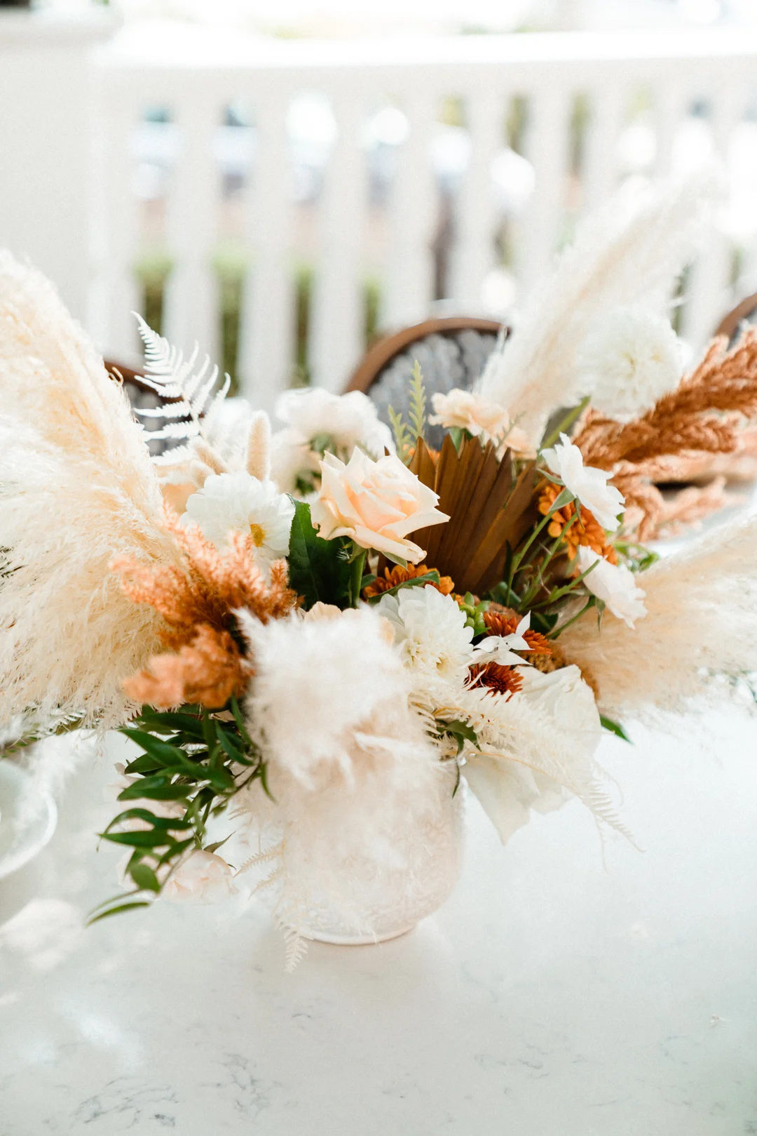 White floral and pampas grass centerpiece