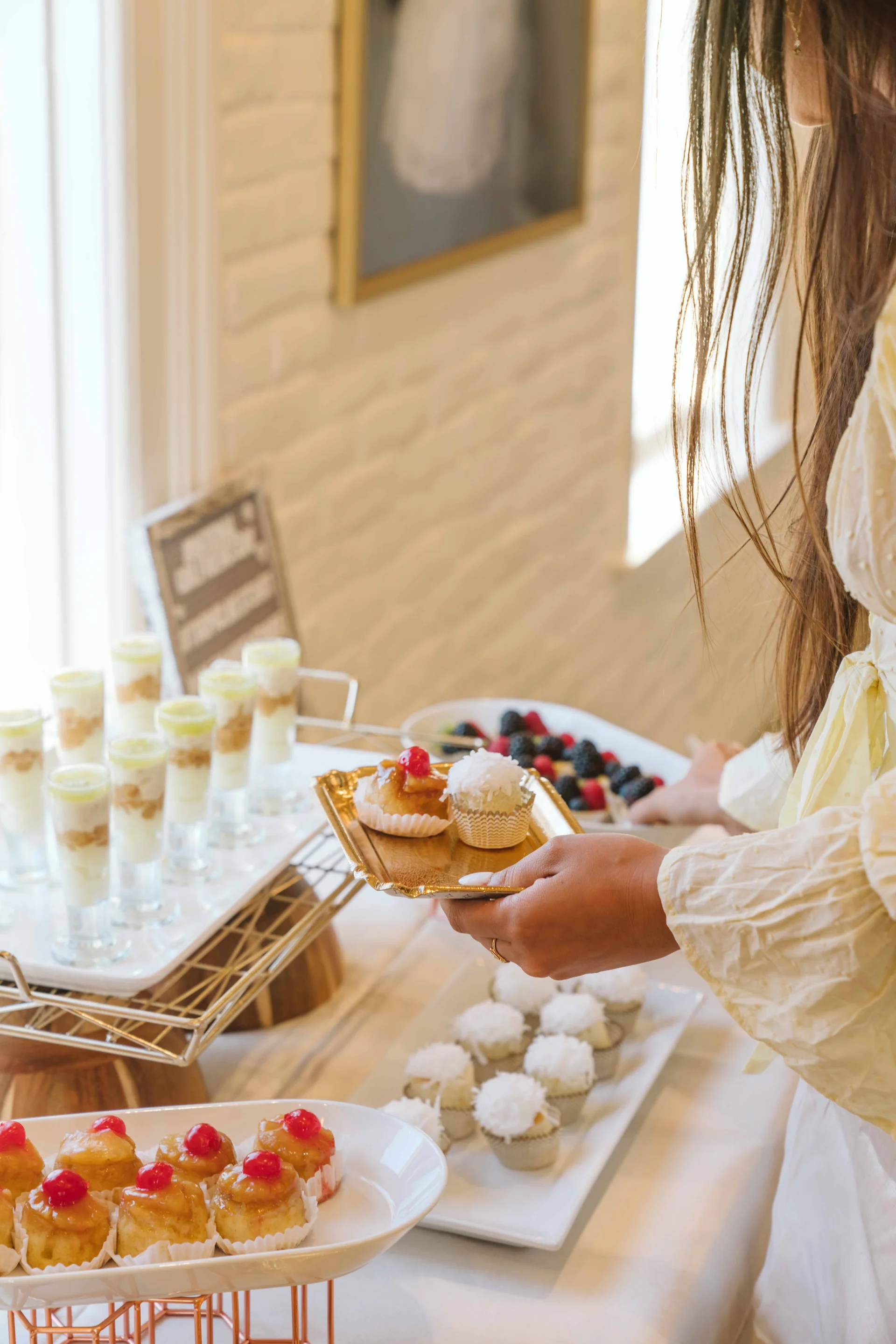 Tropical dessert station with fruit tarts and dessert shots