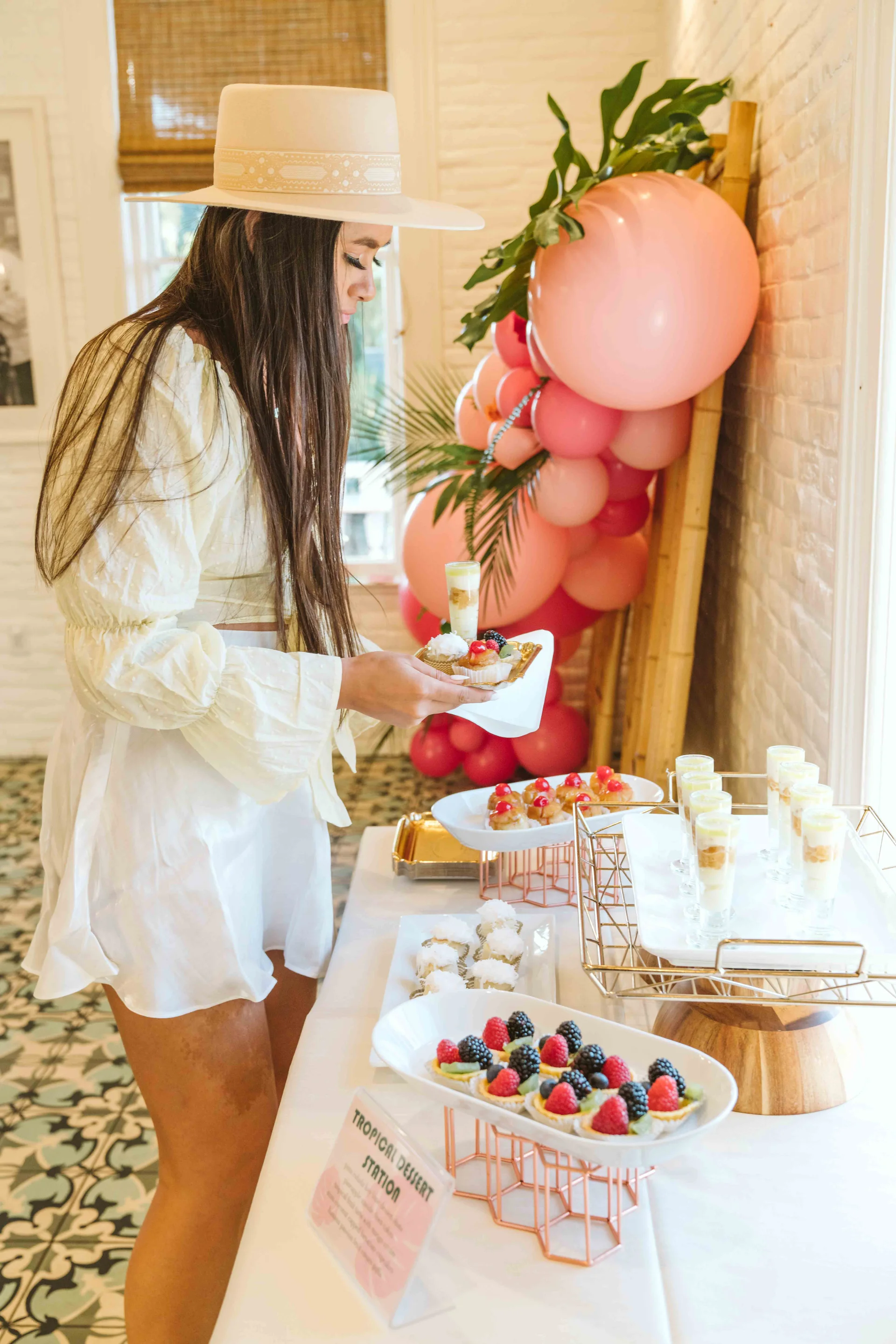 Woman choosing a dessert from the display