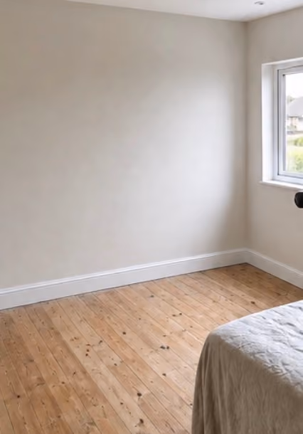 Bedroom before fitted wardrobes were installed