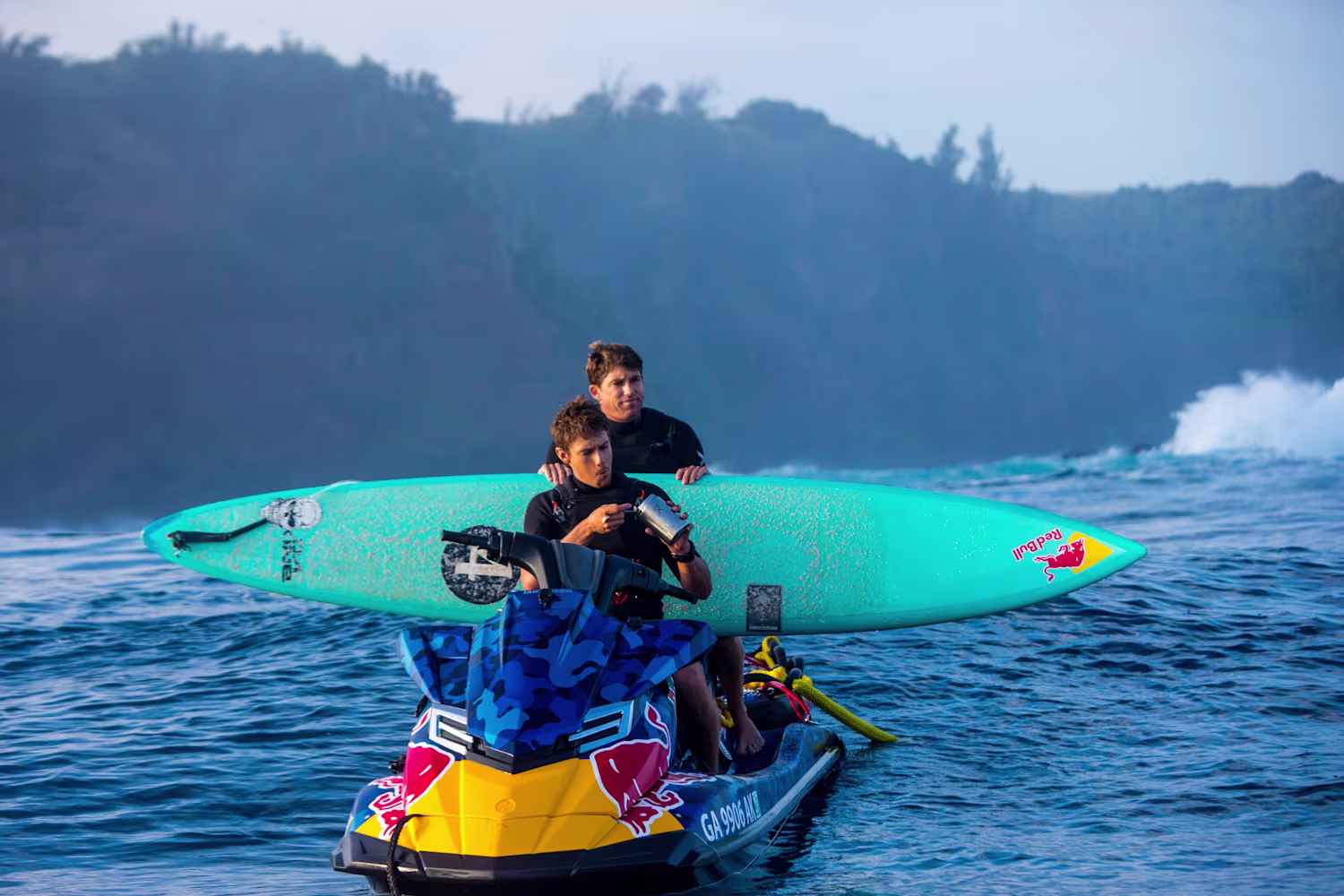 Surfer on the back of a jet ski 
