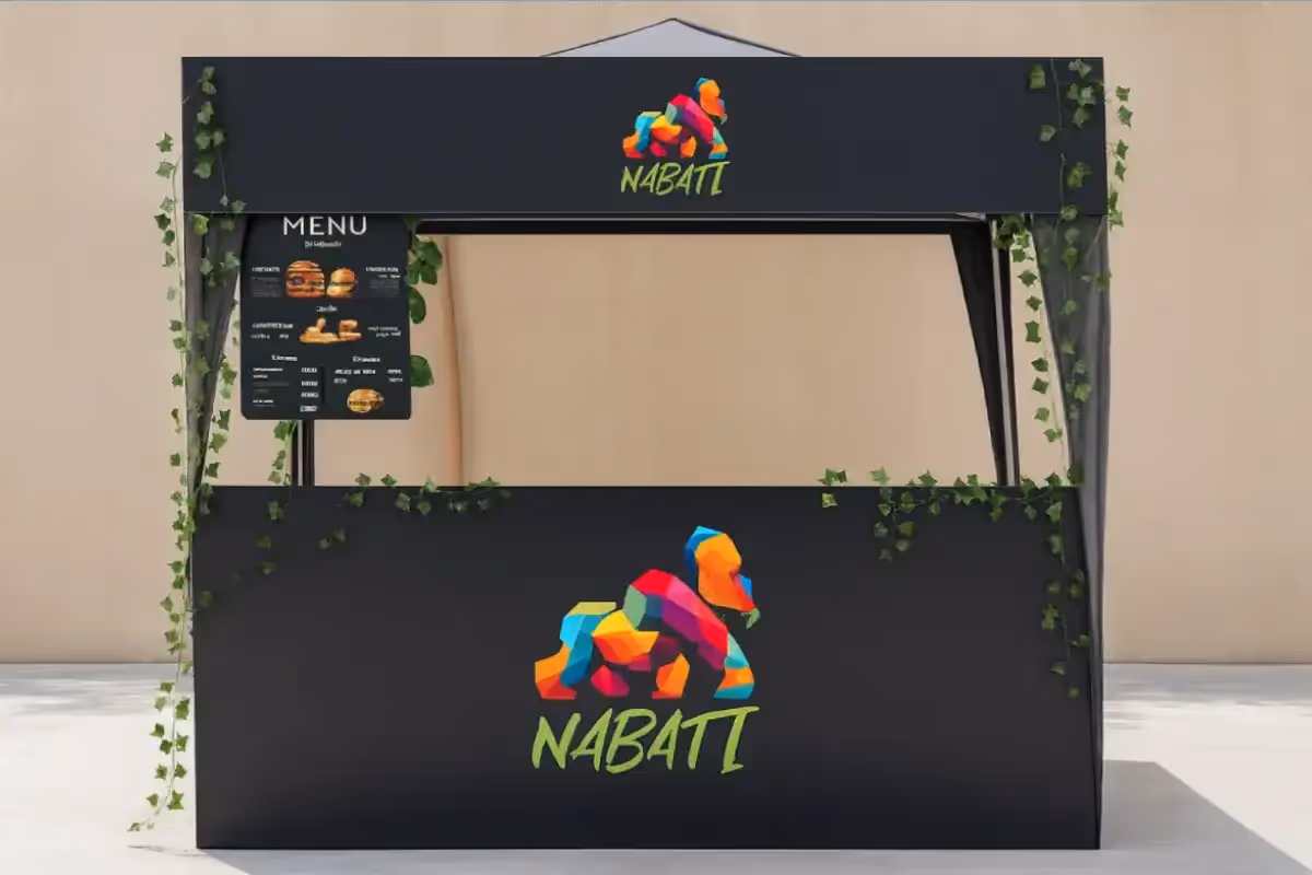 Custom branded canopy tent providing portable outdoor shelter for UAE plant-based restaurant's event activations and promotional displays