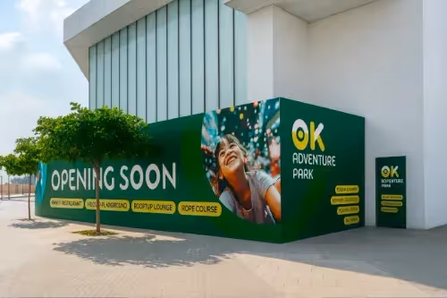 Construction barriers represent massive graphic canvases in high-traffic locations where thousands view daily. Rather than bare plywood signaling disruption, professional graphics transform necessities into marketing assets generating awareness and interest.