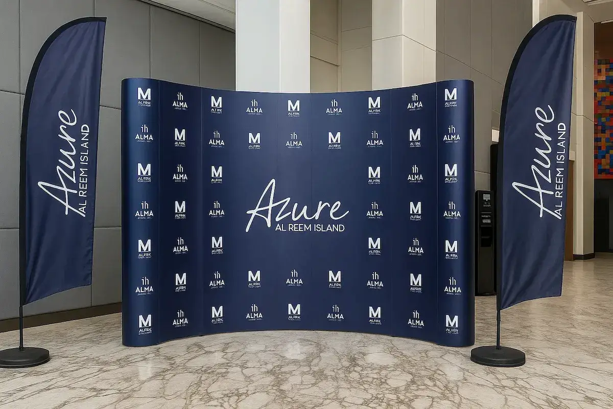 Modular display systems and fabric structures designed for trade shows, exhibitions, and outdoor activations with repeatable assembly and transport.