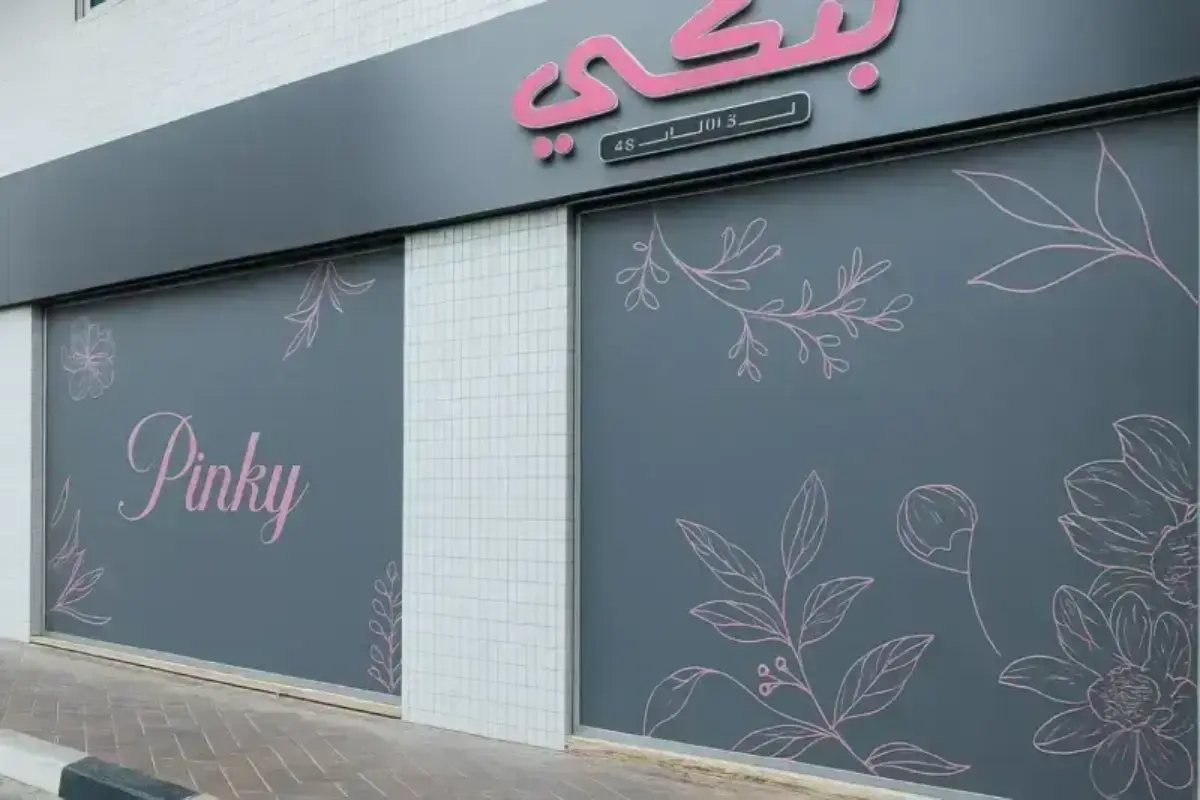 Ornamental floral-pattern window graphics with decorative design for beauty salon storefront privacy and brand aesthetic enhancement.