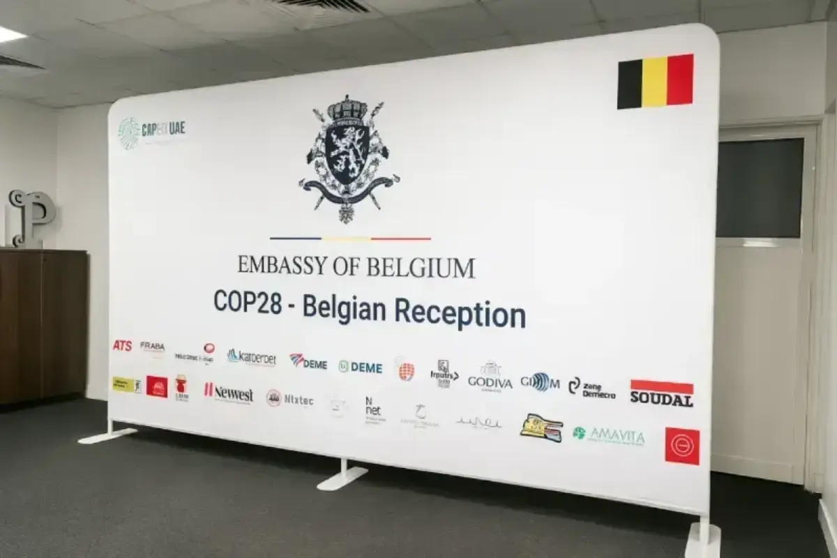 Double-sided tension fabric banner providing diplomatic event backdrop for embassy receptions and formal gatherings.