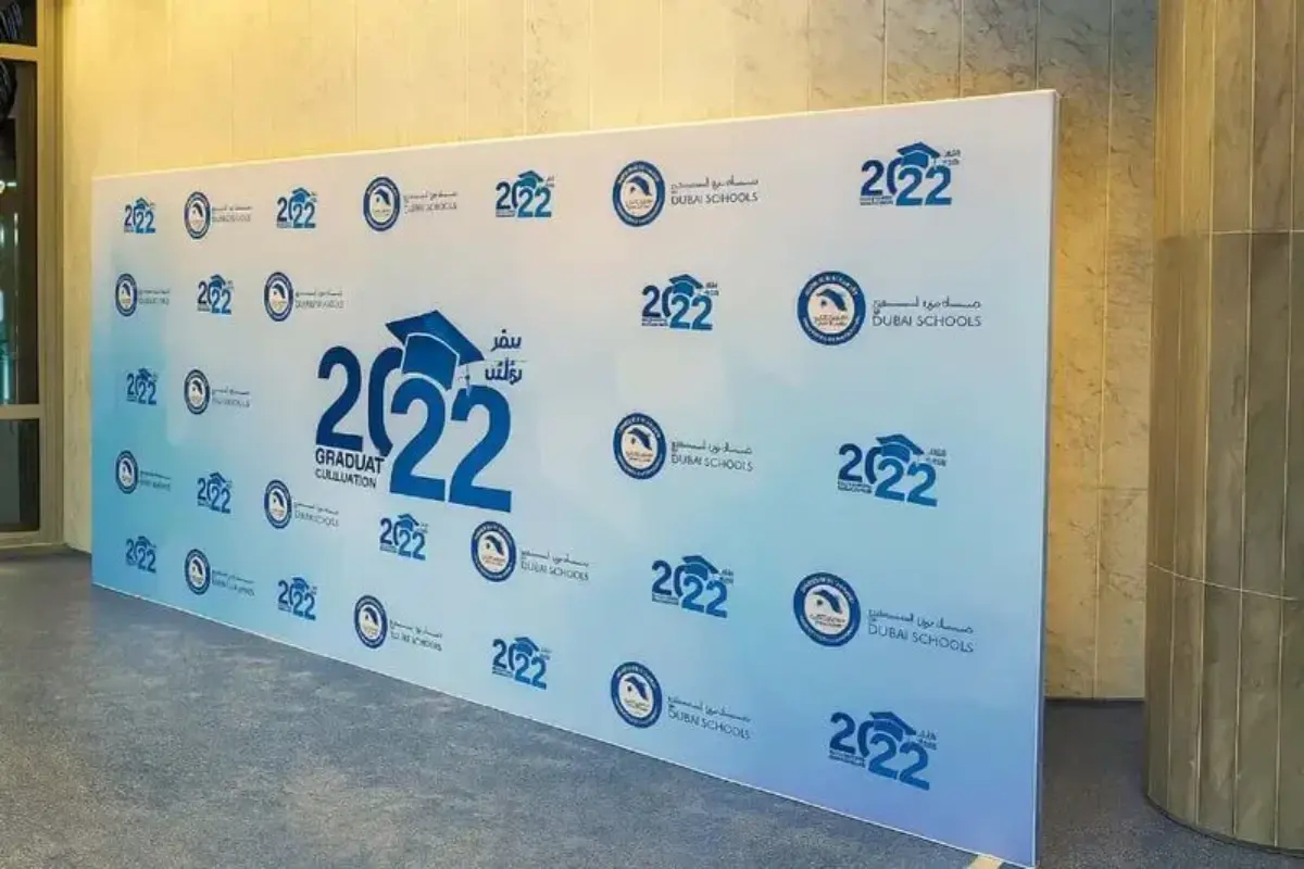 Custom tension fabric banner delivering branded backdrop for private event requiring specific dimensions and visual presentation.