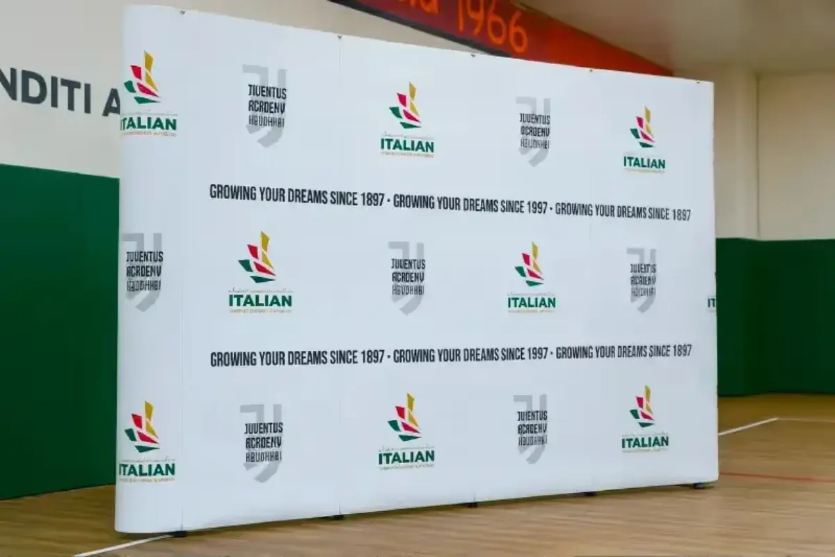 300cm by 300cm straight pop-up display stand with matching counter table for international school events and parent information exhibitions.