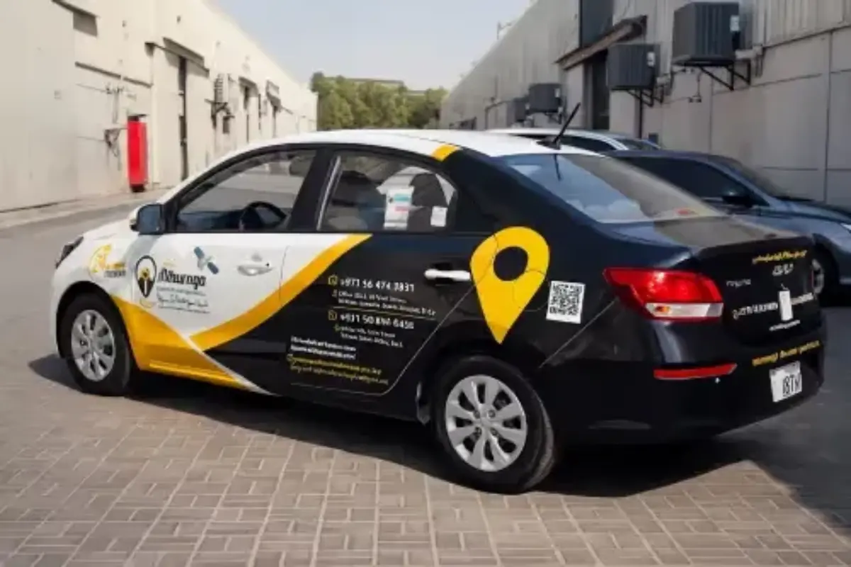 11-vehicle fleet branding with Dubai RTA and CID permit coordination for GPS technology provider's corporate and service vehicle graphics