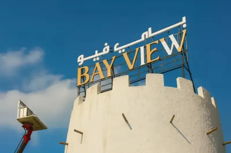 Bay View gold and white 3D letters Rooftop & High-Rise Signage tower installation Marina Square Al Reem Island Abu Dhabi Ninety Nine Advertising LLC