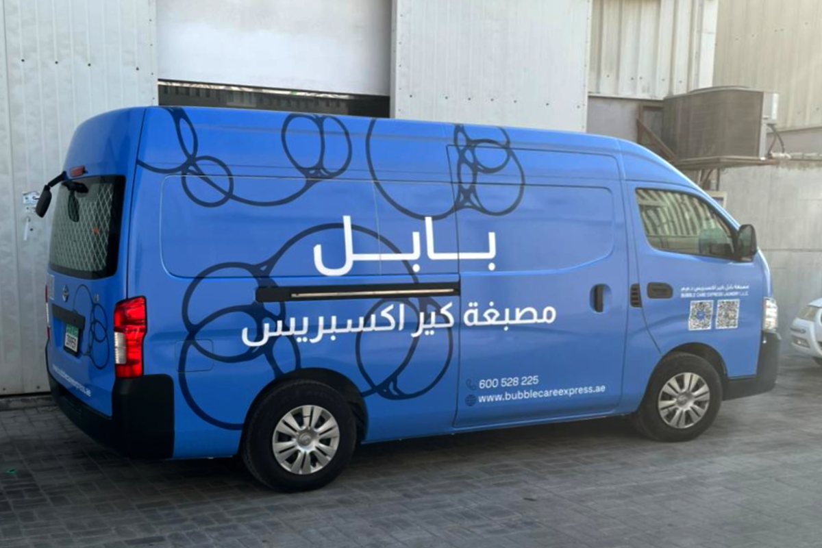 full-vehicle-branding-nissan-urvan-high-roof-van-bubble-care-express-abu-dhabi