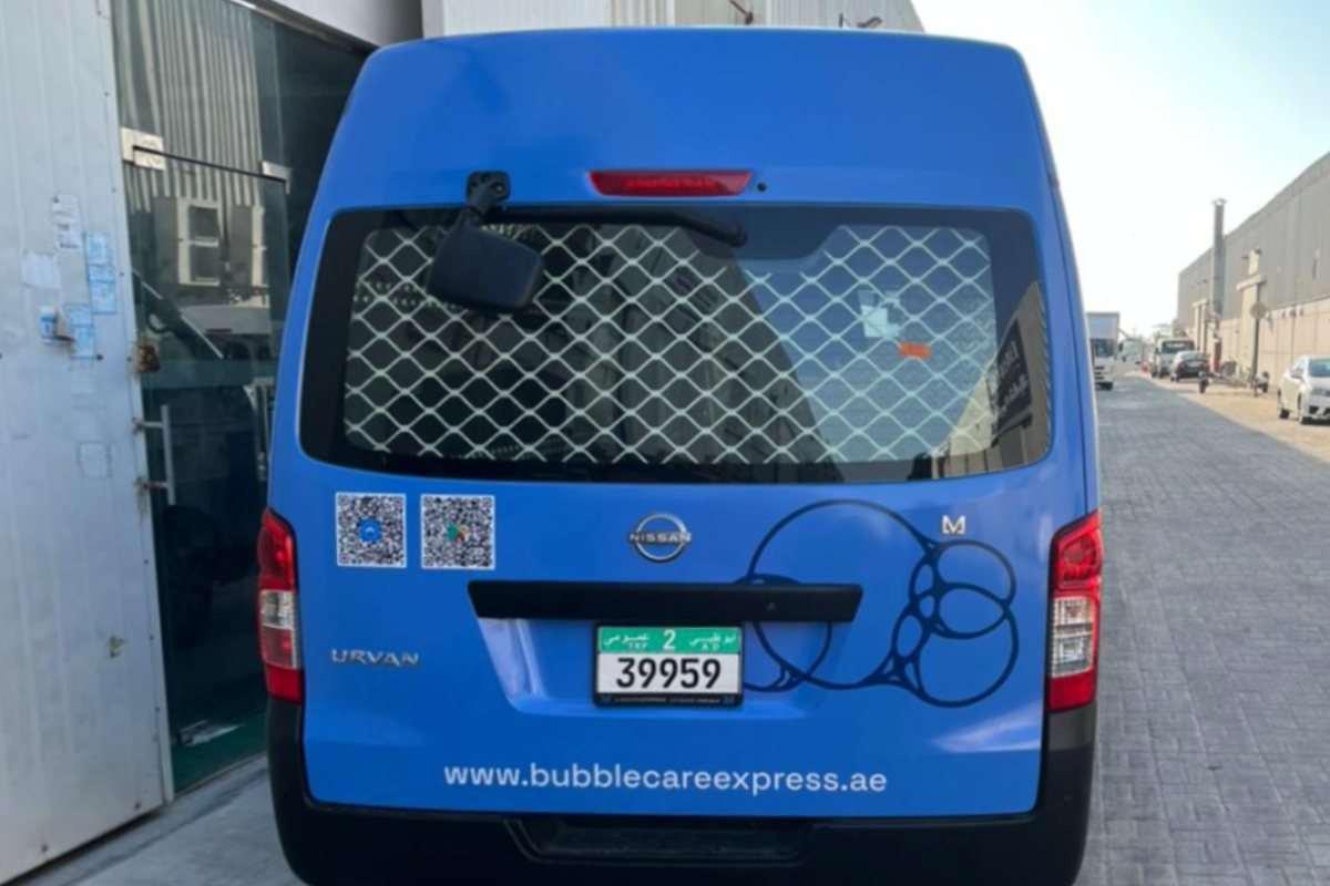 high-impact-rear-panel-fleet-branding-with-qr-codes-nissan-urvan-abu-dhabi