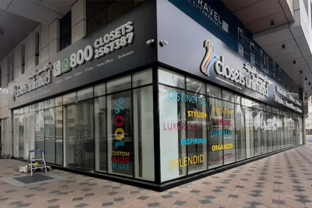 Frontlit 3D letters on black ACP tray signboard for Closets Unlimited showroom