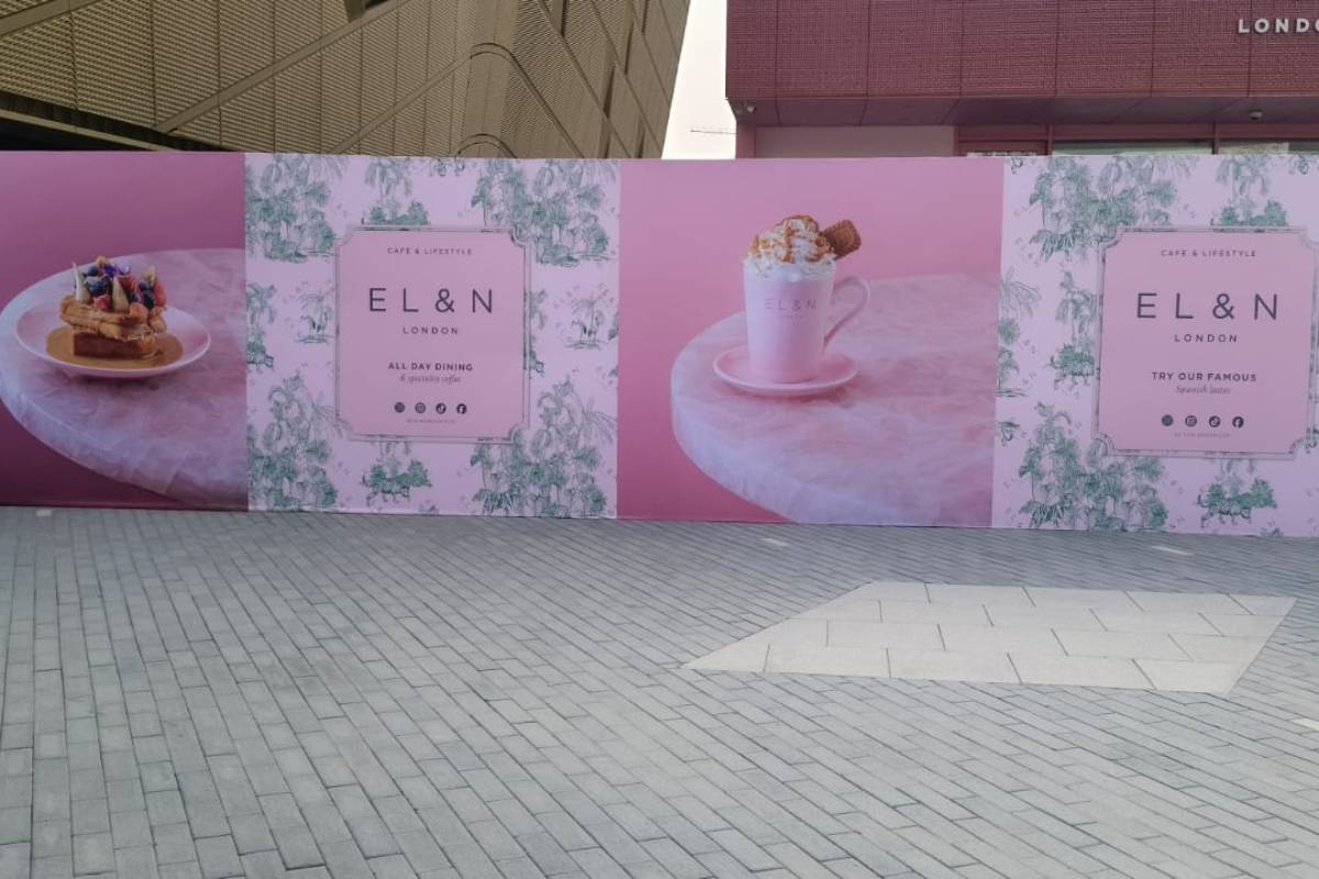 Large-scale EL&N London hoarding graphics with food photography and branded panels