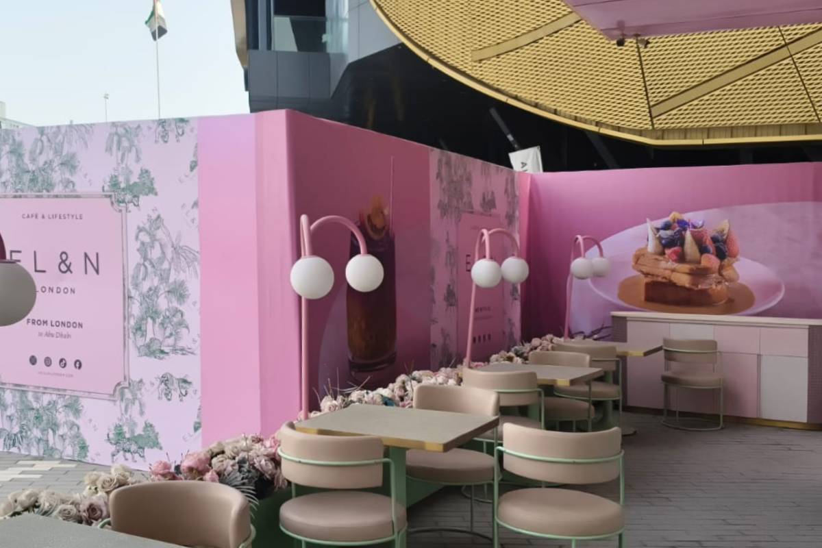 Branded café hoarding installation surrounding the EL&N London outdoor seating area