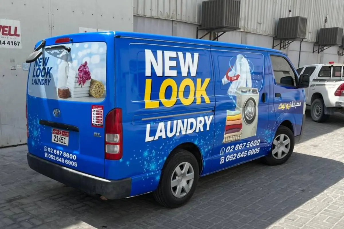 New Look Laundry full van branding on a Toyota HiAce in Abu Dhabi