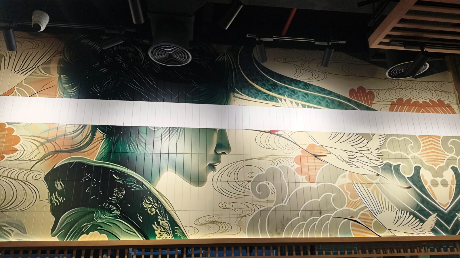 Golden Dragon restaurant wall graphics on tiled wall