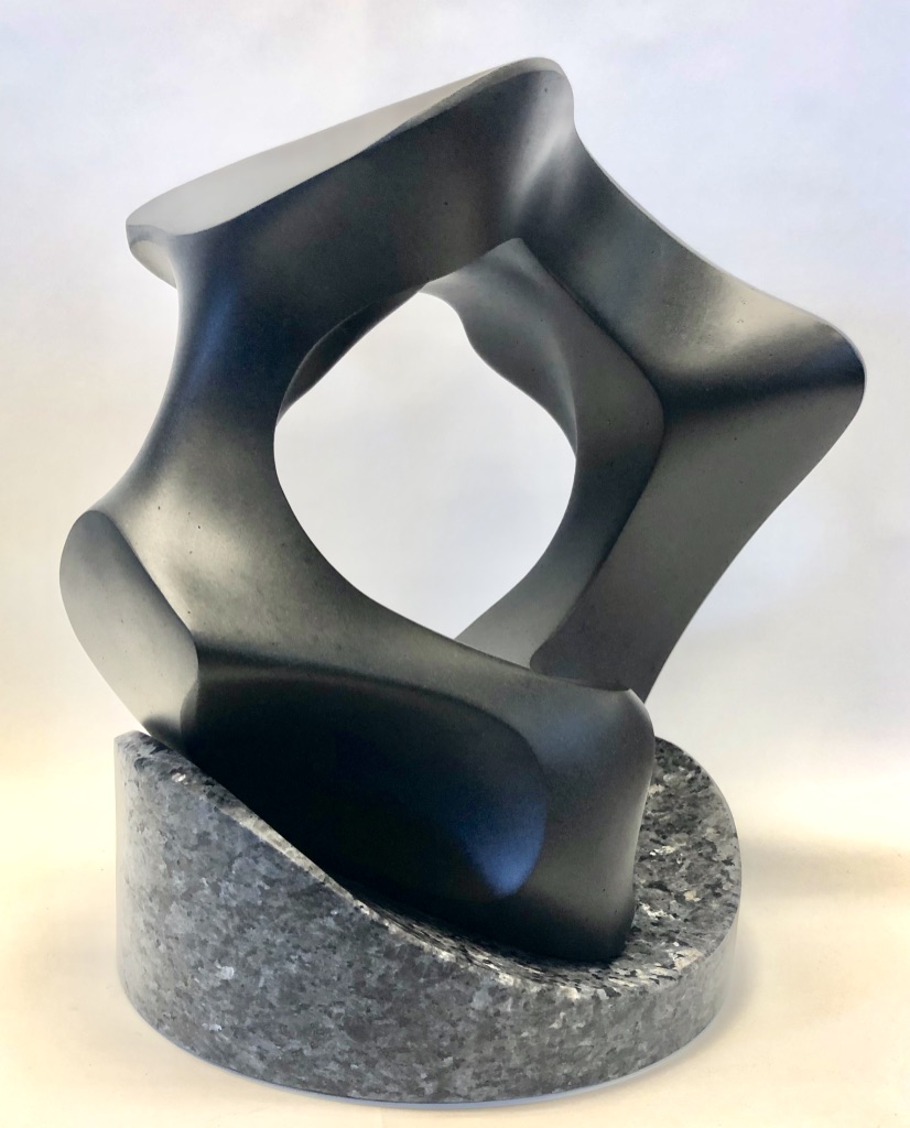 “Equatorial Equinox #10” NW Basalt on Blue Pearl Granite 15” H x 12” W x 10” D $3500