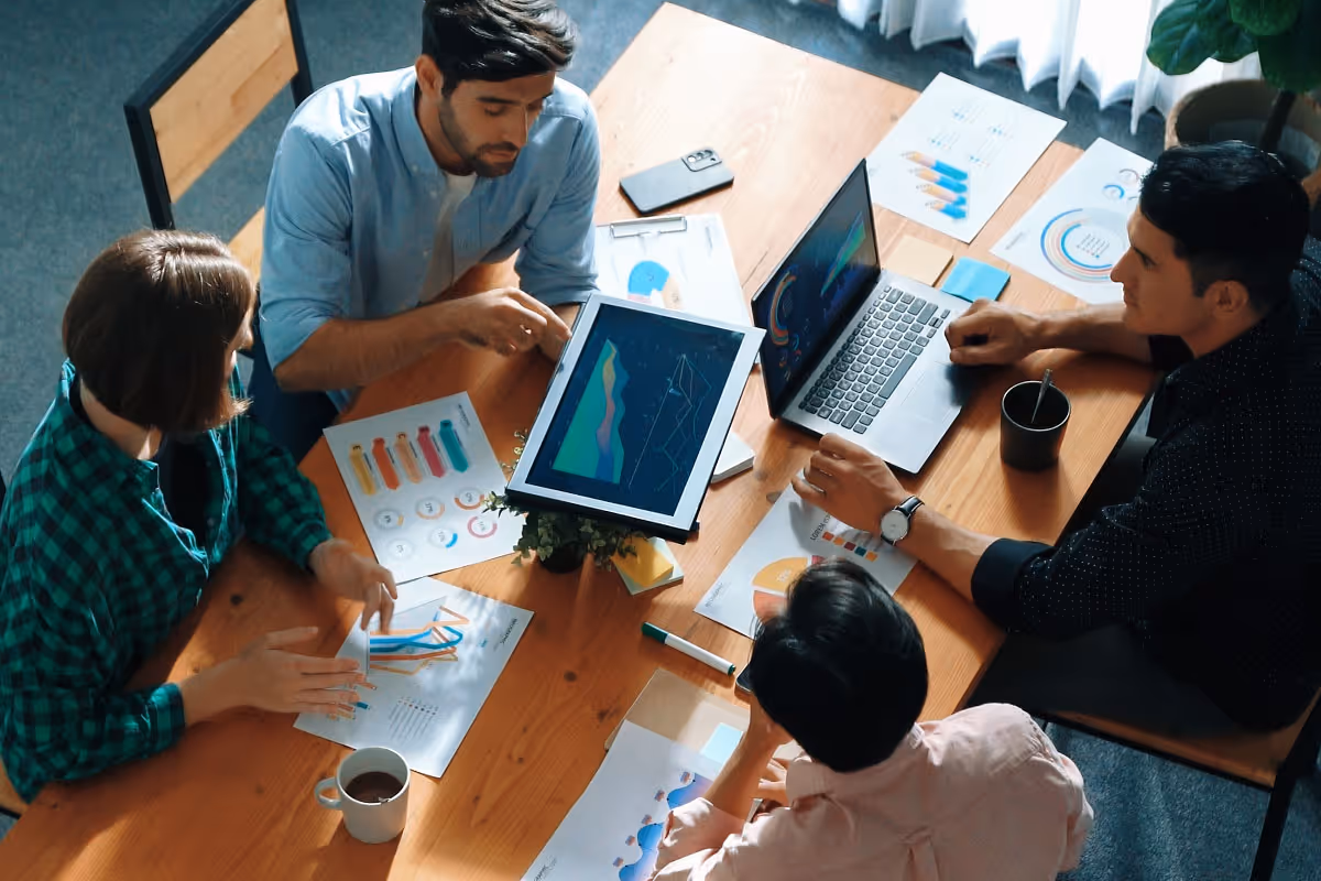 Team reviewing integration progress and success metrics