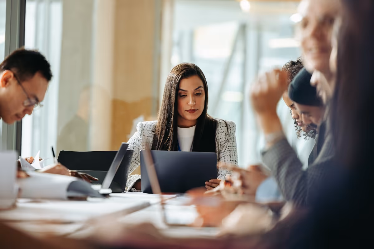 Team working out the details of an M&A deal