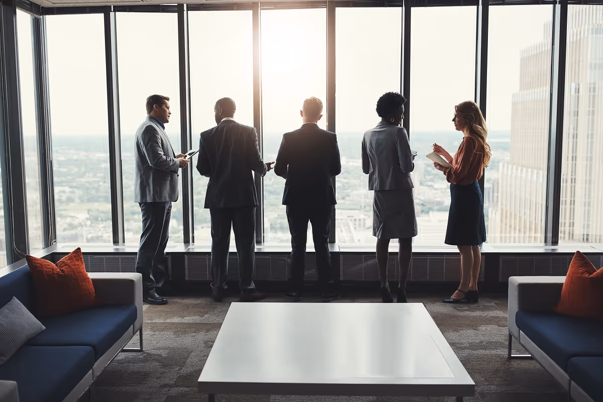 Leadership team discussing a private investment opportunity during an offering memorandum review