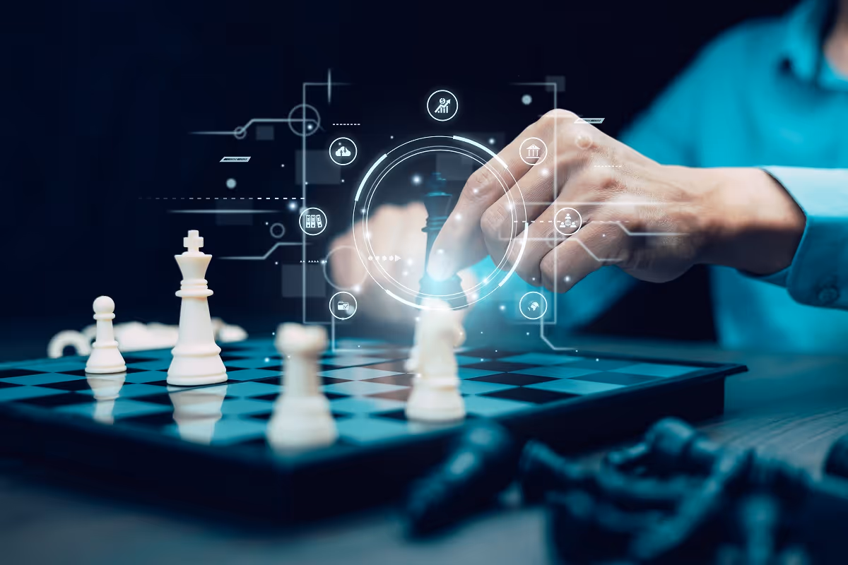 Hand moving a chess piece on a chessboard, representing strategic decision-making in mergers and acquisitions