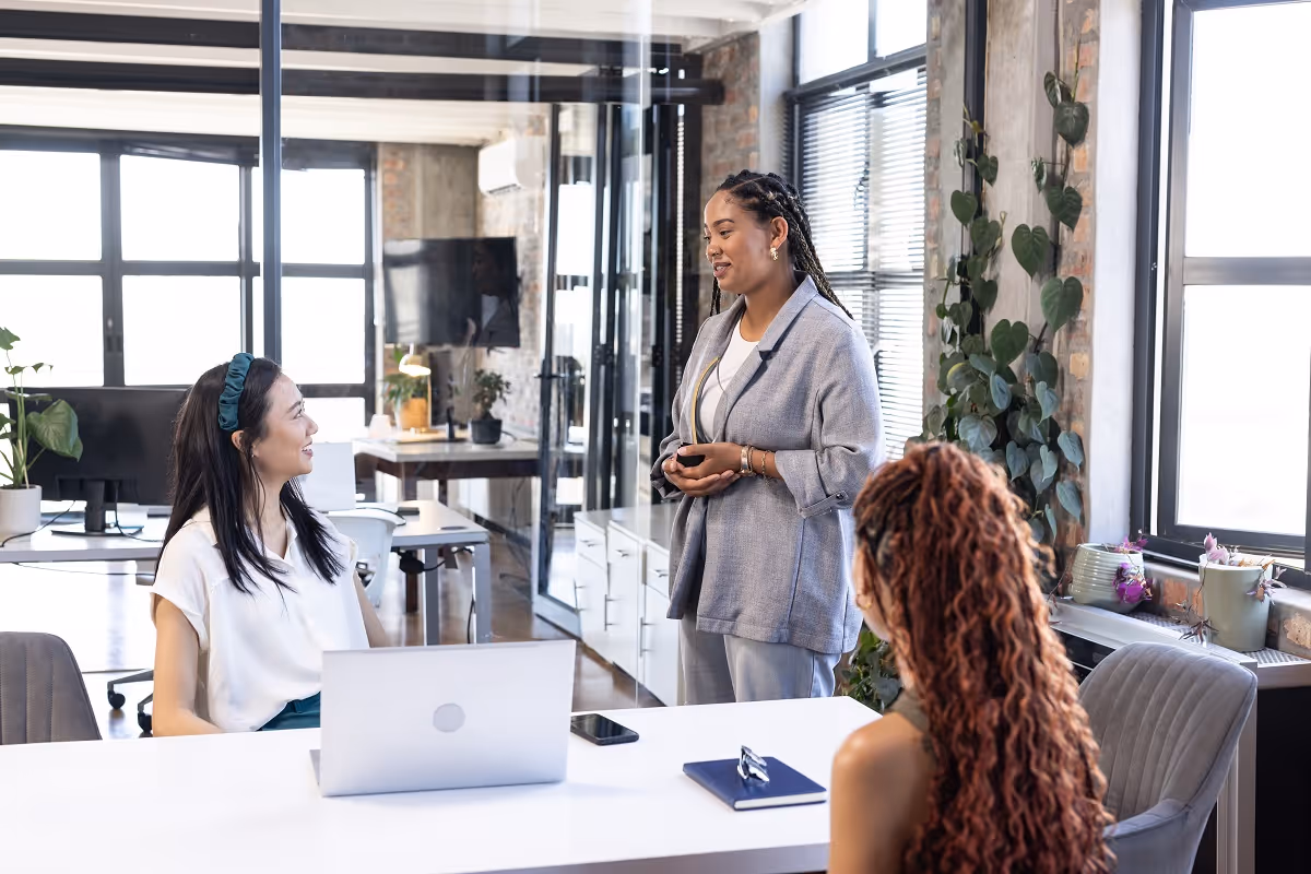 Corporate development team discussing buy-side acquisition strategy and investment opportunities