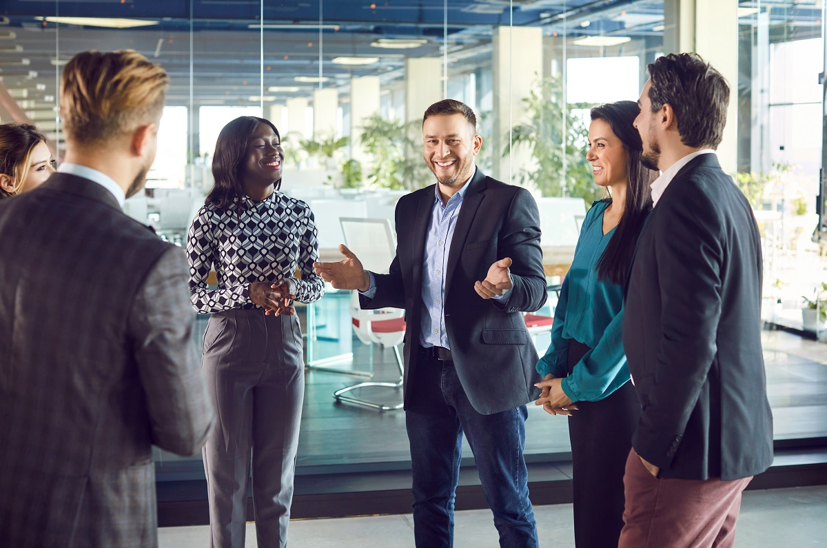 Corporate development team and buy-side M&A advisors collaborating on acquisition planning and transaction strategy