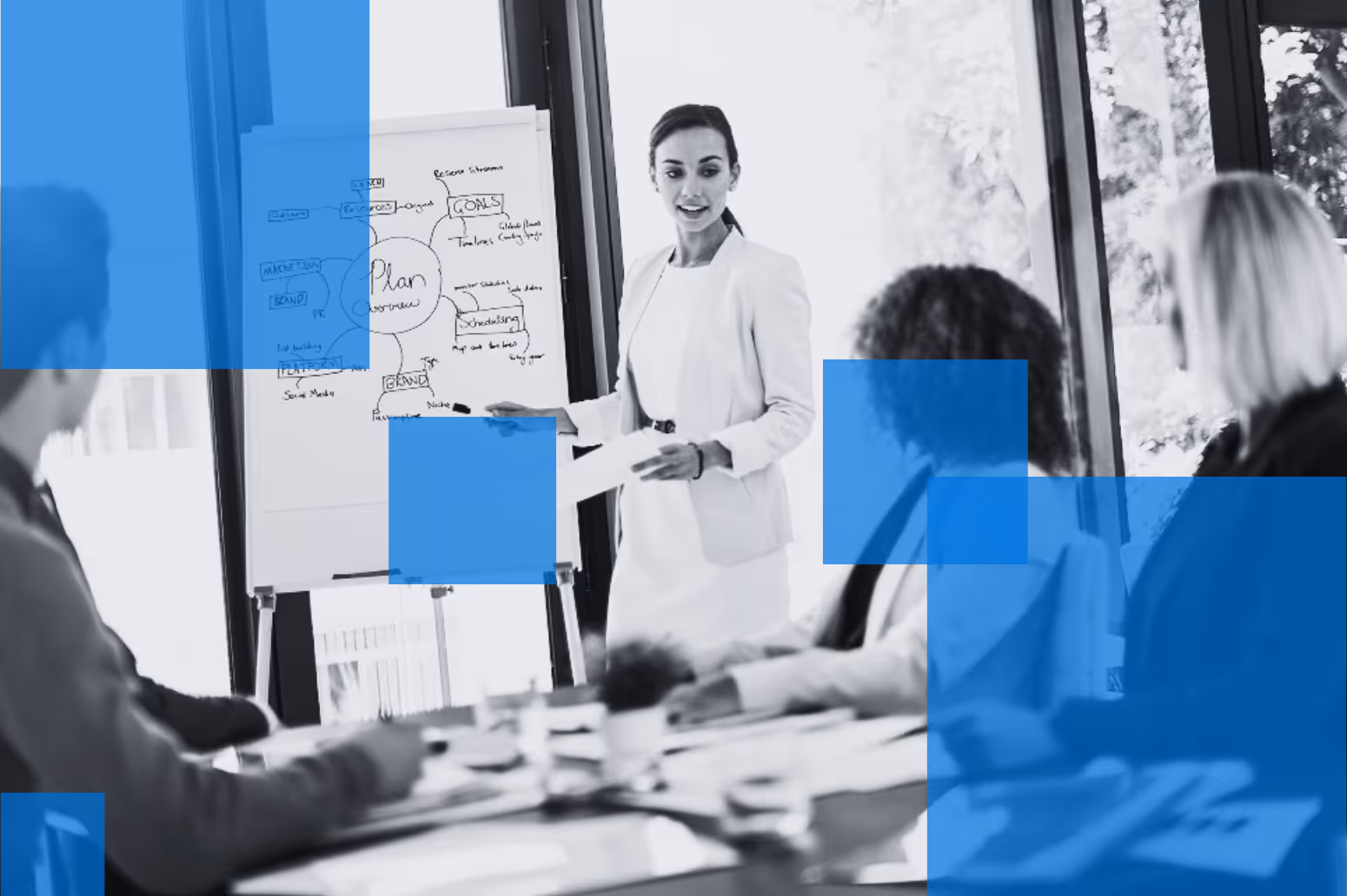 Business team discussing M&A strategy and acquisition target evaluation during a corporate planning meeting