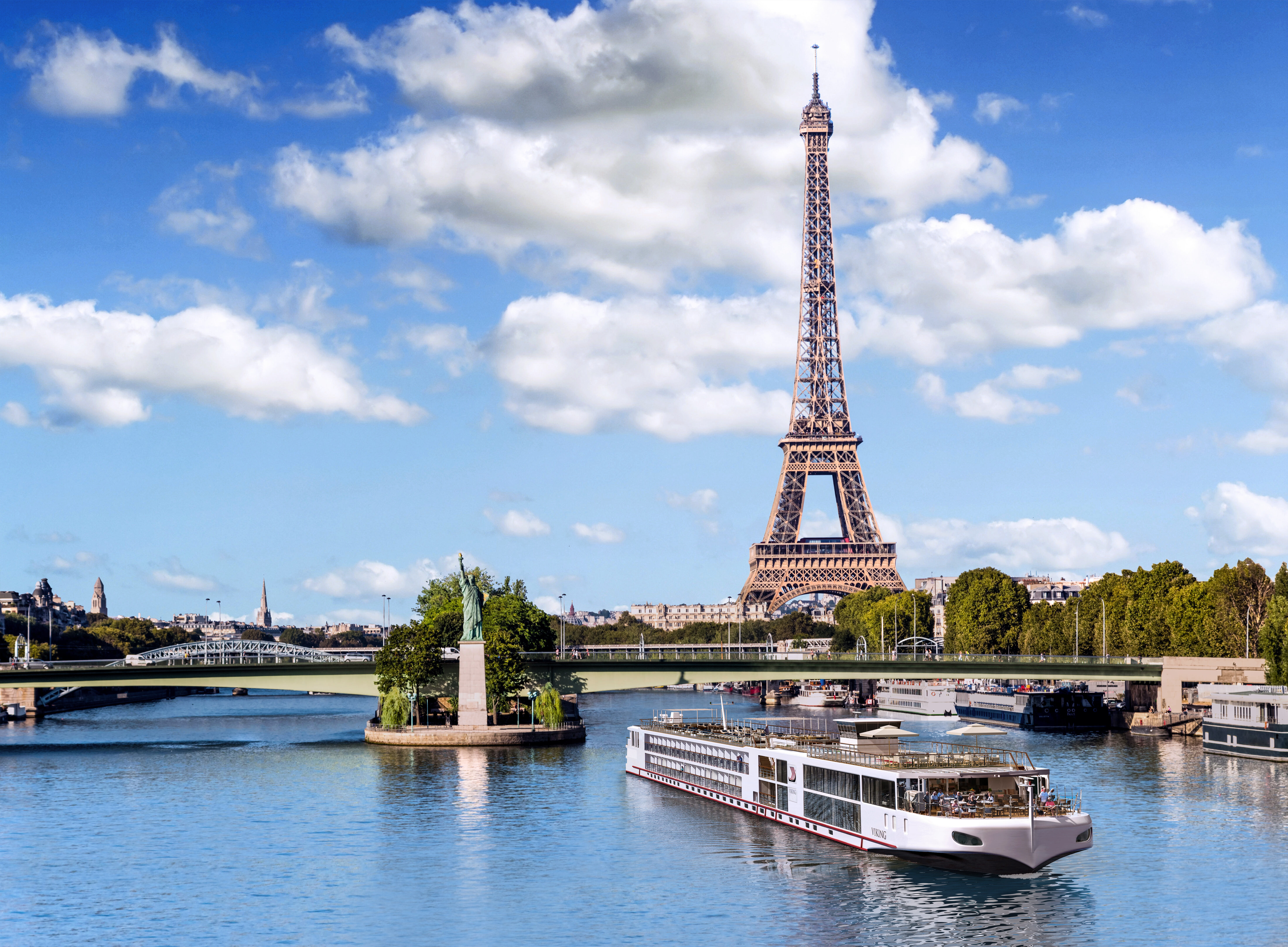 Viking Longship cruising the Seine River with the Eiffel Tower in the background, Paris 2026