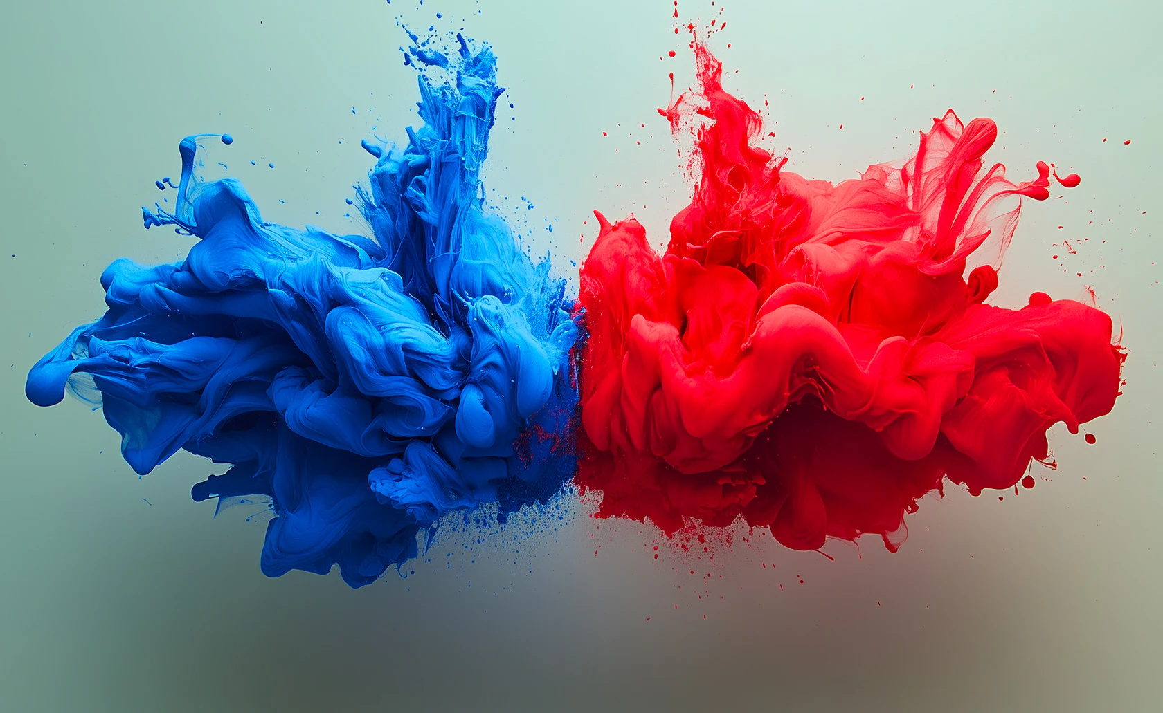 Nuages de peinture bleue et rouge se rencontrant.