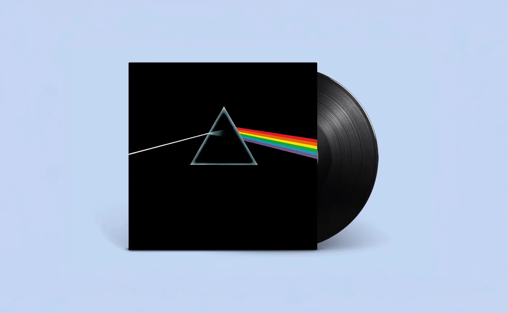 Disque vinyle et pochette représentant un prisme traversé par un rayon multicolore.