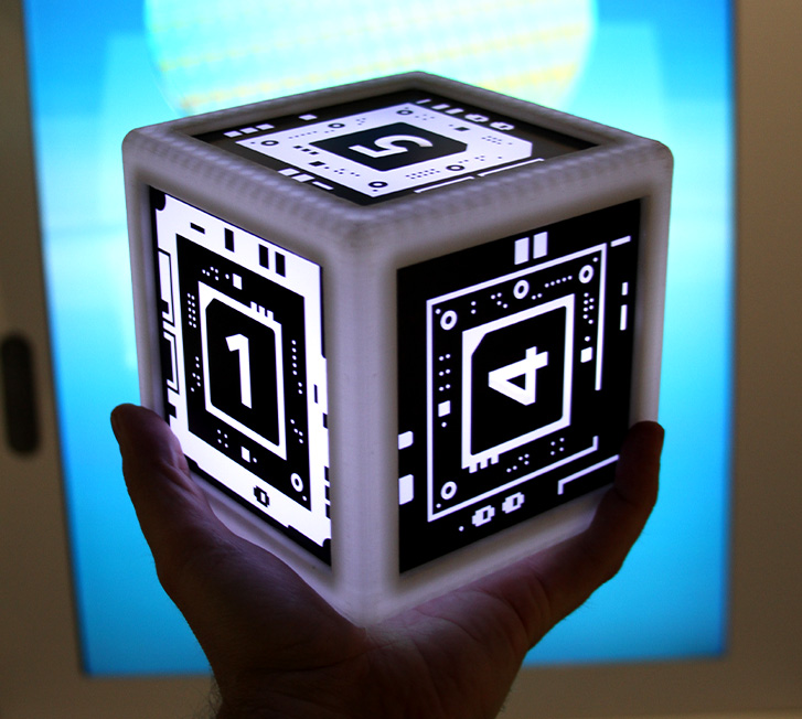 Intel Museum exhibit lighted cube close up being held in hand