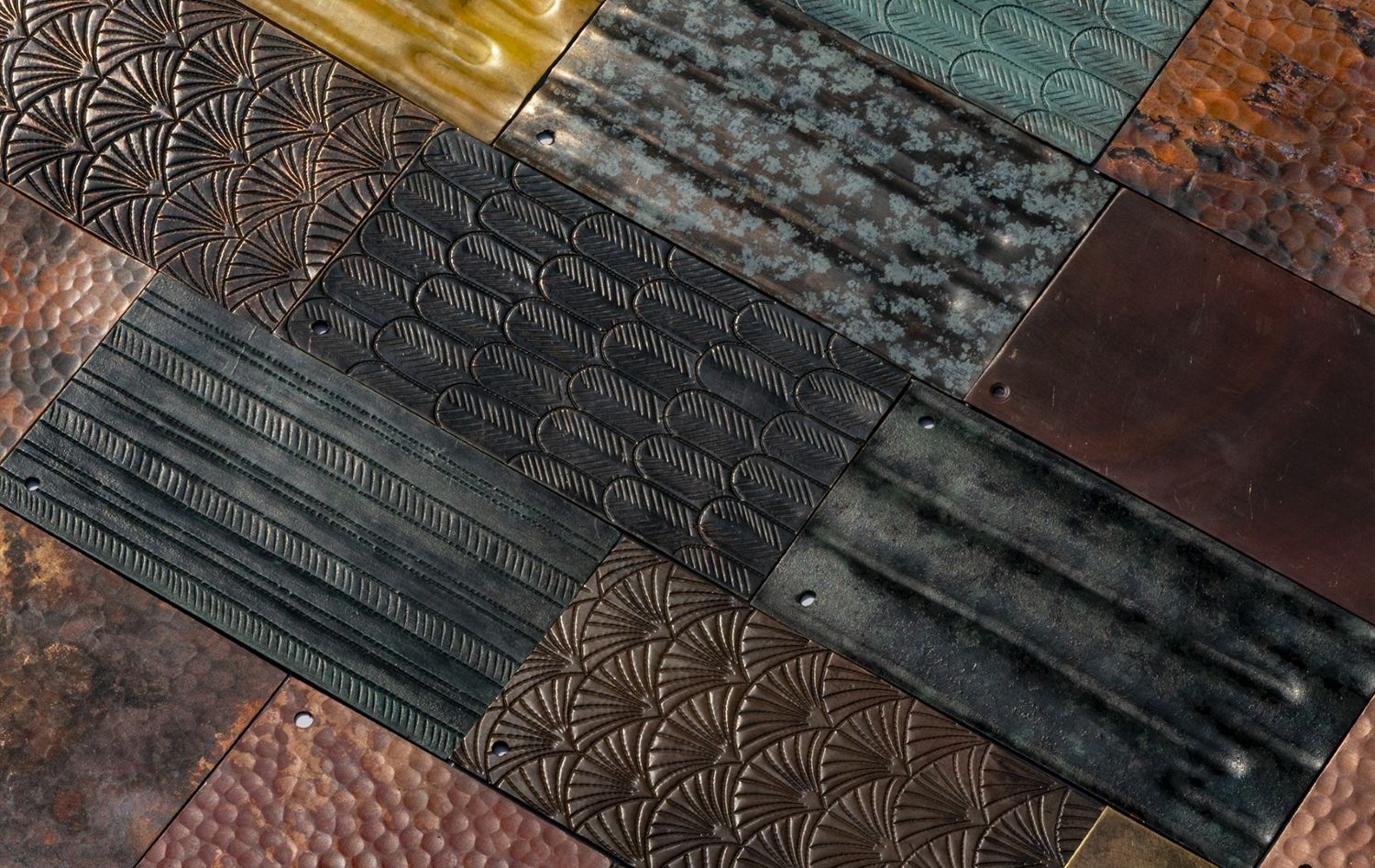 patchwork of amoretti brothers copper and brass patinas and handcrafted finishing