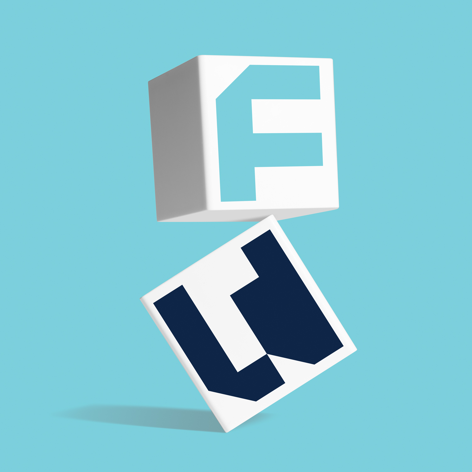 Two white cubes with letters, one with a light blue 'F' and the other with a navy 'U', floating against a light blue background.