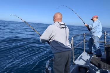 Two men fishing in the boat