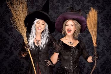 Two women dressed as witches