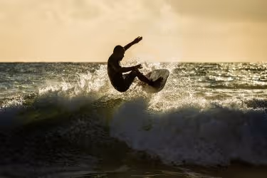 Man surfing in the afternoon