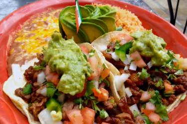 Beef tacos with beans and rice