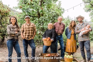 Group of friends and family picking apples