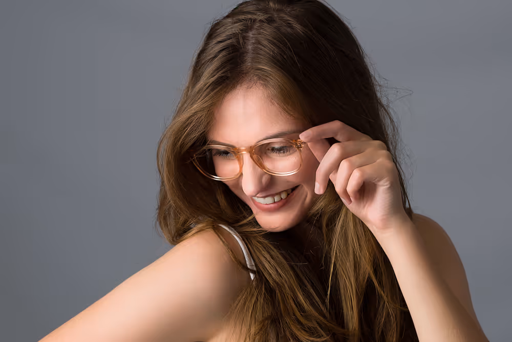 model trying on glasses