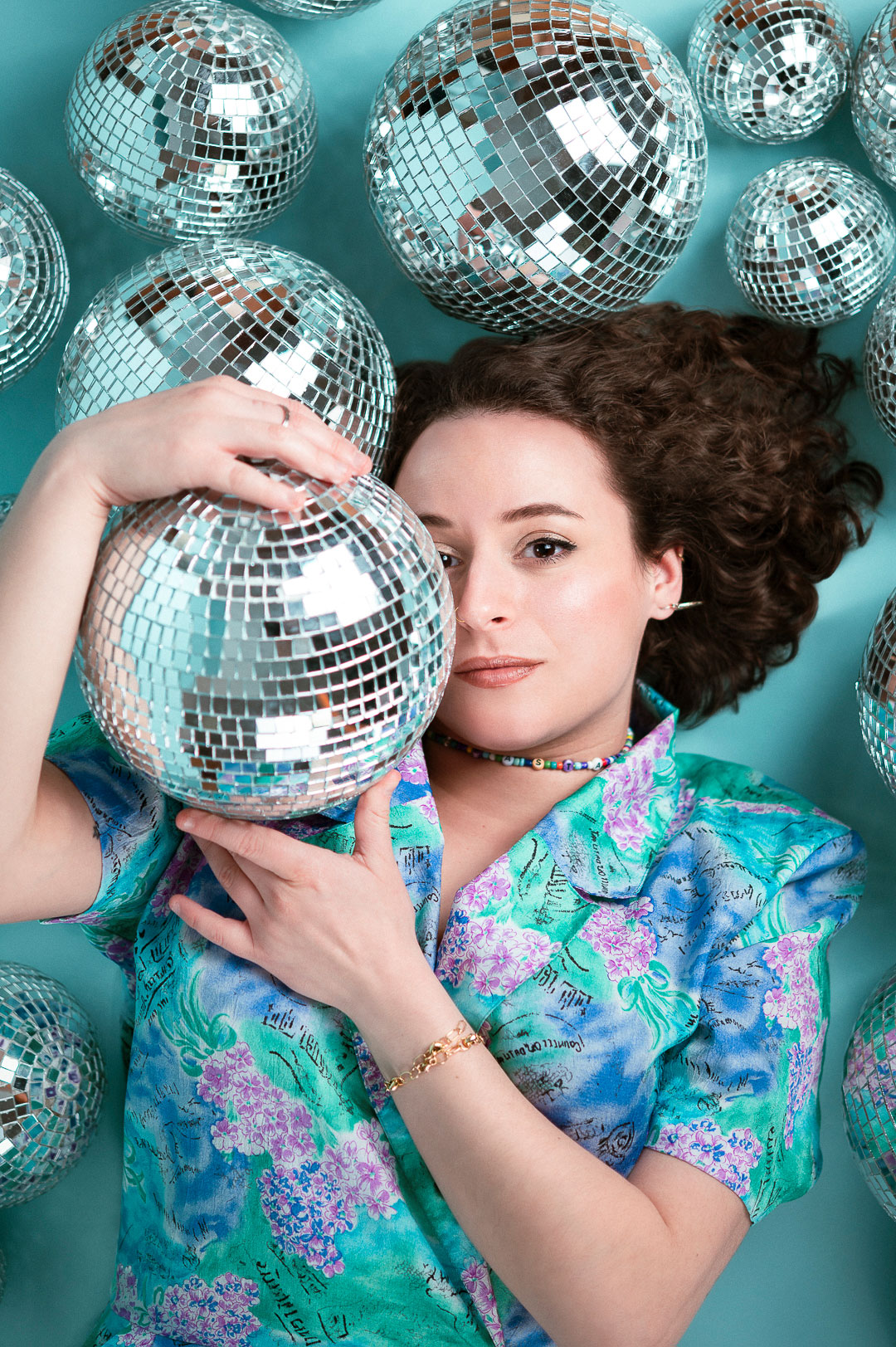 A free model portrait series, photographed by Sarah Häfner. A disco-ball photo series for and with the female DJane Valeria.